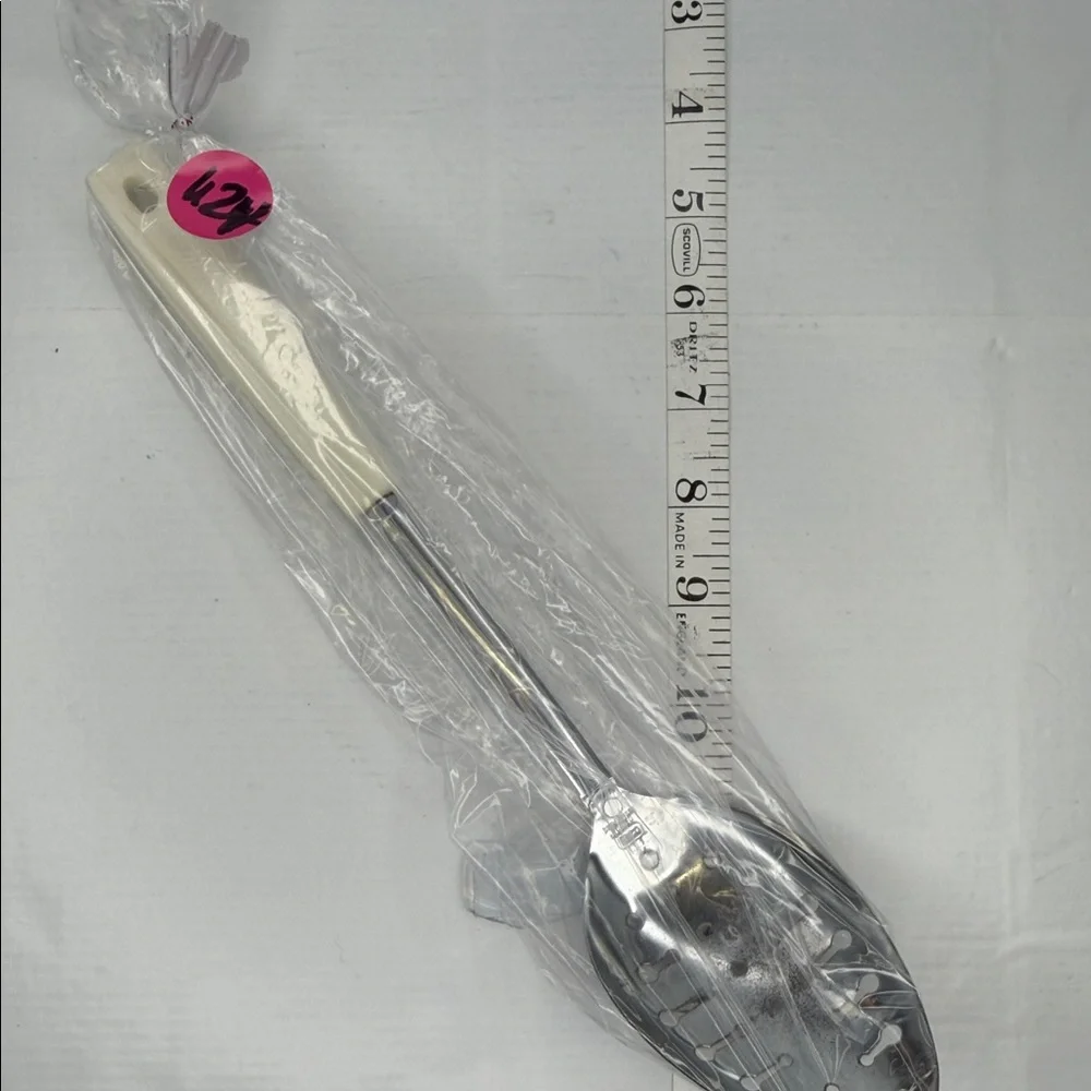 Vintage EKCO Chromium Plated Slotted Spoon with Cream Handle